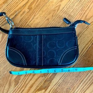 Coach small purse. Black. Non smoking home. Good shape